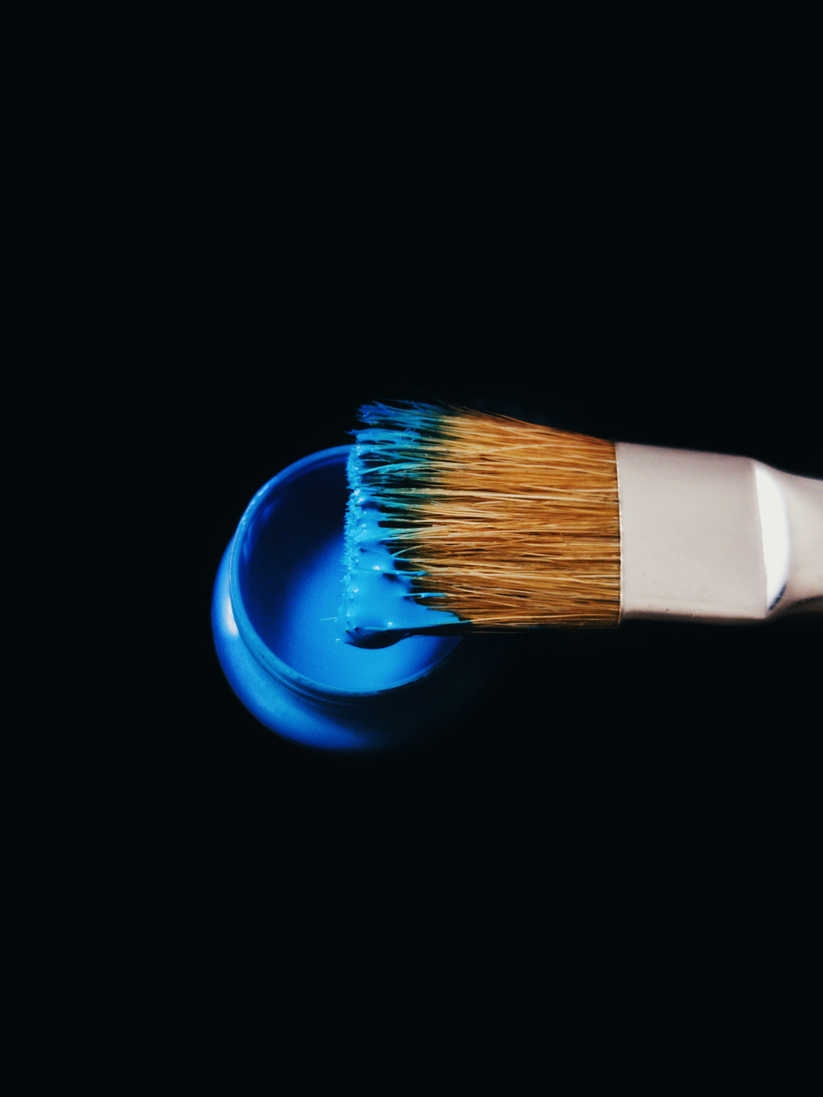 Paint brush and blue paint