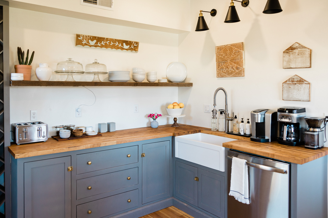 Kitchen with blue cabinetry
